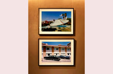 Load image into Gallery viewer, A vintage parasol, poolside at the El Morocco Motel, Las Vegas, Nevada, overlooked by palm trees, blue skies and iconic neon signs. Part of Richard Heeps' 'Dream in Colour' series.