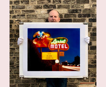 Load image into Gallery viewer, 'Lariat Motel II' is a classic Richard Heeps Americana 'Sign Porn' artwork. It was captured in its original site in Fallon, Nevada. The owners since sold the Lariat Motel and donated the 1950's sign with original neon tubing to the Churchill Arts Council. This photograph forms part of Richard Heeps' 'Dream in Colour' series.