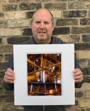 Load image into Gallery viewer, Light breaks through the cracks in the barn on the movie set of Clint Eastwood's Western film 'The Outlaw Josey Wales'. Captured in Kanab, Utah, which was the setting of many Western movies. Photographed by Richard Heeps for his 'Dream in Colour' series.
