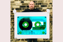 Load image into Gallery viewer, Tape Collection, 'Ferric 60 (Aqua)'. The Heidler &amp; Heeps collaborations are creative representations of Natasha Heidler and Richard Heeps’ personal past, and their personalities. Tapes are significant in both their lives and the work here is made from their own collections. Their unique process makes these artworks not inanimate objects, rather they have depth, texture, grit, and they even appear to move.