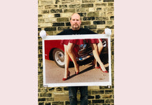 Load image into Gallery viewer, 'Glamour Cabs', photographed by Richard Heeps at the glamorous retro event Goodwood Revival. It perfectly captures elegant feminine sophistication with a vintage vibe, a nod to the film Carry on Cabbie. This artwork featured in Richard Heeps' 2018-2019 exhibition WEMEN, at Nhow Hotel Milan.
