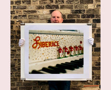 Load image into Gallery viewer, 'Liberace's Piano I' was photographed in a private Las Vegas home. The studded gems and decorative typography make for an archetypal Las Vegas feel. This artwork is part of Richard Heeps' 'Dream in Colour' series. 