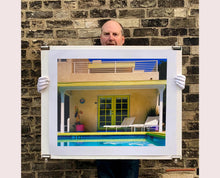 Load image into Gallery viewer, Palm Springs Pool Side II showcases classic mid-century Palm Springs California architecture. Cool blue skies and pool with accents of pink and almost neon yellow. From Richard Heeps Dream in Colour series.
