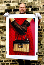 Load image into Gallery viewer, This stylish artwork, 'Floral Wicker Bag' taken at the glamorous retro event Goodwood Revival in Chichester, perfectly captures feminine sophistication with a vintage vibe.