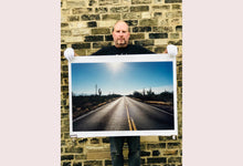 Load image into Gallery viewer, 'Road to Gunsight' photographed on Highway 86, Arizona in 2001 is part of Richard Heeps' 'Dream in Colour' series. This classic American open road imagery appears throughout his work. 
