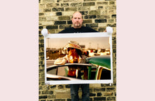 Load image into Gallery viewer, 'Sun Kissed Wendy', from Richard Heeps' 'Man's Ruin' Series. This artwork is part of a sequence capturing Wendy at the Rockabilly Weekender, Viva Las Vegas. This cinematic portrait of Wendy captures her kissed by the sunset.