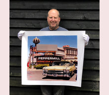 Load image into Gallery viewer, 'The Silver State' was taken by Richard whilst at Viva Las Vegas 2001, where he was photographing for Classic American magazine. This photograph which shows a vintage car in front of a typical Las Vegas backdrop was chosen as the lead image for the magazine feature which focused on the iconic La Concha motel.
