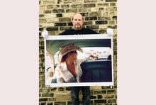 Load image into Gallery viewer, Wendy and Dolls, from Richard Heeps 'Man's Ruin' Series, this is part of a sequence of artworks capturing Wendy at the Rockabilly Weekender, Viva Las Vegas. This cinematic portrait of Wendy captures her in the back seat of her classic American Oldsmobile.