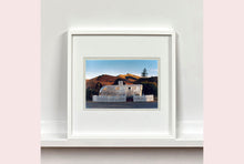 Load image into Gallery viewer, This artwork brings about a romantic dream of living in an RV. Captured in the morning sun at the start of a beautiful Arizona day, this RV is surrounded by both a white picket fence and a beautiful landscape, with the sun tickling the hilltops. Photographed as part of Richard Heeps' 'Dream in Colour' series.