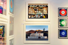 Load image into Gallery viewer, This artwork brings about a romantic dream of living in an RV. Captured in the morning sun at the start of a beautiful Arizona day, this RV is surrounded by both a white picket fence and a beautiful landscape, with the sun tickling the hilltops. Photographed as part of Richard Heeps' 'Dream in Colour' series.