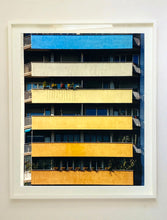 Load image into Gallery viewer, 'Rainbow Apartments' captures Italian design and architecture, showing a multi-coloured nineteen-sixties block of flats. This artwork is part of Richard Heeps' series 'A Short History of Milan' which began in November 2018 for a special project featuring at the Affordable Art Fair Milan 2019, and the series is ongoing. There is a reoccurring linear, structural theme throughout the series, capturing the Milanese use of materials in design such as glass, metal, wood and stone. 
