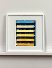 Load image into Gallery viewer, 'Rainbow Apartments' captures Italian design and architecture, showing a multi-coloured nineteen-sixties block of flats. This artwork is part of Richard Heeps' series 'A Short History of Milan' which began in November 2018 for a special project featuring at the Affordable Art Fair Milan 2019, and the series is ongoing. There is a reoccurring linear, structural theme throughout the series, capturing the Milanese use of materials in design such as glass, metal, wood and stone. 