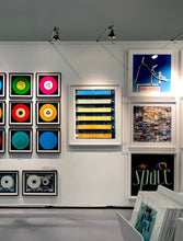 Load image into Gallery viewer, 'Rainbow Apartments' captures Italian design and architecture, showing a multi-coloured nineteen-sixties block of flats. This artwork is part of Richard Heeps' series 'A Short History of Milan' which began in November 2018 for a special project featuring at the Affordable Art Fair Milan 2019, and the series is ongoing. There is a reoccurring linear, structural theme throughout the series, capturing the Milanese use of materials in design such as glass, metal, wood and stone. 