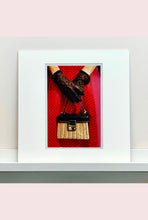 Load image into Gallery viewer, This stylish artwork, 'Floral Wicker Bag' taken at the glamorous retro event Goodwood Revival in Chichester, perfectly captures feminine sophistication with a vintage vibe.
