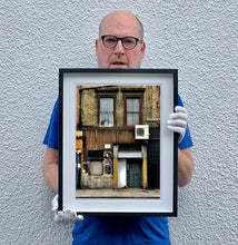 Load image into Gallery viewer, East London brick building architecture street photography by Richard Heeps framed in black.