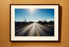 Load image into Gallery viewer, 'Road to Gunsight' photographed on Highway 86, Arizona in 2001 is part of Richard Heeps' 'Dream in Colour' series. This classic American open road imagery appears throughout his work. 