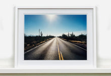 Load image into Gallery viewer, 'Road to Gunsight' photographed on Highway 86, Arizona in 2001 is part of Richard Heeps' 'Dream in Colour' series. This classic American open road imagery appears throughout his work. 