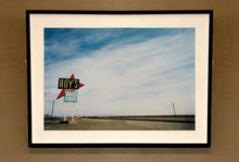 Load image into Gallery viewer, Part of the 'Dream in Colour' series, 'Roy's - Route 66' is one of Richard Heeps' classic American sign artworks featuring the road sign for Roy's Motel, which demonstrates historic Mid-Century Modern Googie architecture. This photograph was capture on the National Trails Highway of U.S. Route 66, in the Mojave Desert town of Amboy in San Bernardino County, California.