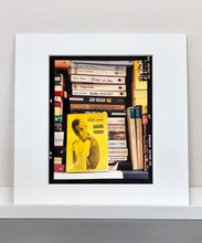 Load image into Gallery viewer, ‘Scientific Sexology’ sits amongst a stack of books, captured in Milan, Italy. 