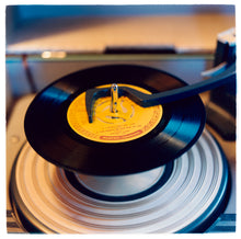 Load image into Gallery viewer, Photograph by Richard Heeps.  Johnny Cash record "I Walk The Line" with its yellow label is loaded up on a record player.