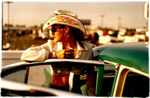 Load image into Gallery viewer, 'Sun Kissed Wendy', from Richard Heeps' 'Man's Ruin' Series. This artwork is part of a sequence capturing Wendy at the Rockabilly Weekender, Viva Las Vegas. This cinematic portrait of Wendy captures her kissed by the sunset.