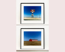 Load image into Gallery viewer, 'Stars &amp; Stripes Barn' shows a depiction of the American flag painted on this isolated building in Oakhurst, California. It sits on the horizon against a vast bright blue sky. This artwork is part of Richard Heeps' 'Dream in Colour' series.
