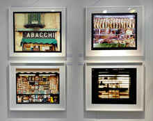 Load image into Gallery viewer, Silhouettes seen through a shop window in Milan. 