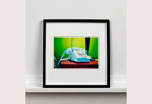 Load image into Gallery viewer, 'Telephone III, Ballantines Movie Colony' is part of Richard Heeps' 'Dream in Colour' series. This cool Palm Springs interior artwork features a vintage telephone on a nightstand, combining gorgeous colours with a nostalgic mid-century feel.
