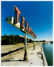 Load image into Gallery viewer, Photograph by Richard Heeps.  An old Texaco Marina sign sits next to California's largest marina.  Set against a deep blue sky.