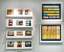 Load image into Gallery viewer, As part of Richard Heeps' series, A Short History of Milan, The Last Kiss features a series of yellow, blue and pink Italian books.