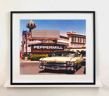 Load image into Gallery viewer, 'The Silver State' was taken by Richard whilst at Viva Las Vegas 2001, where he was photographing for Classic American magazine. This photograph which shows a vintage car in front of a typical Las Vegas backdrop was chosen as the lead image for the magazine feature which focused on the iconic La Concha motel.