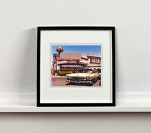 Load image into Gallery viewer, 'The Silver State' was taken by Richard whilst at Viva Las Vegas 2001, where he was photographing for Classic American magazine. This photograph which shows a vintage car in front of a typical Las Vegas backdrop was chosen as the lead image for the magazine feature which focused on the iconic La Concha motel.