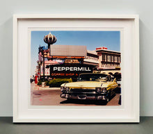 Load image into Gallery viewer, 'The Silver State' was taken by Richard whilst at Viva Las Vegas 2001, where he was photographing for Classic American magazine. This photograph which shows a vintage car in front of a typical Las Vegas backdrop was chosen as the lead image for the magazine feature which focused on the iconic La Concha motel.
