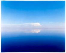 Load image into Gallery viewer, 'View from Bombay Beach' looks over Salton Sea in California. Cooling shades of blue, reflection and symmetry are key to this serene waterscape. The suspended cloud which looks surreal creates a feeling of weightlessness. 