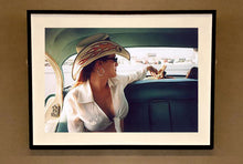 Load image into Gallery viewer, Wendy and Dolls, from Richard Heeps 'Man's Ruin' Series, this is part of a sequence of artworks capturing Wendy at the Rockabilly Weekender, Viva Las Vegas. This cinematic portrait of Wendy captures her in the back seat of her classic American Oldsmobile.