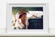 Load image into Gallery viewer, Wendy and Dolls, from Richard Heeps 'Man's Ruin' Series, this is part of a sequence of artworks capturing Wendy at the Rockabilly Weekender, Viva Las Vegas. This cinematic portrait of Wendy captures her in the back seat of her classic American Oldsmobile.