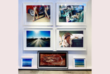 Load image into Gallery viewer, Wendy and Dolls, from Richard Heeps 'Man's Ruin' Series, this is part of a sequence of artworks capturing Wendy at the Rockabilly Weekender, Viva Las Vegas. This cinematic portrait of Wendy captures her in the back seat of her classic American Oldsmobile.
