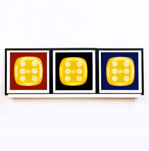 Load image into Gallery viewer, From Heidler &amp; Heeps Dice Series, a yellow dice suspended on a red background.