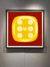 Load image into Gallery viewer, From Heidler &amp; Heeps Dice Series, a yellow dice suspended on a red background.